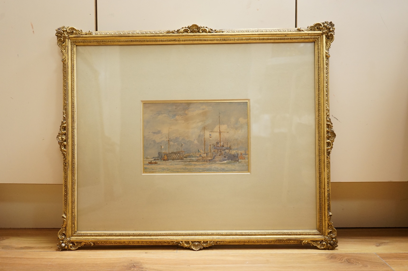 Bernard Finegan Gribble (1873-1962), watercolour, A cruiser steaming past an old hulk anchored in the river, probably Medway, signed, 17 x 25cm